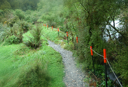 Poles to mark a flooded trail