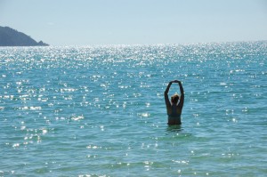 Haywood swimming at Awaroa Bay